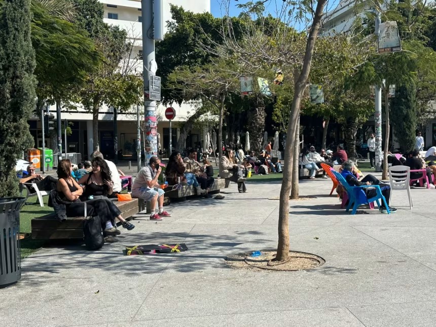 Sirens replace celebrations as Israelis head to shelters on religious holiday
